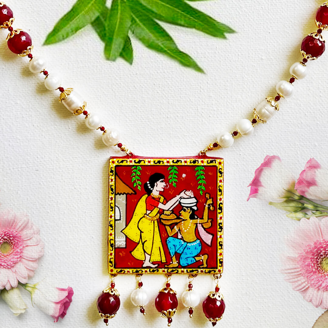 Front View of Timeless Folklore necklace by Bujjis with hand-painted Indian folklore pendant, natural jade beads, real pearls, and gold-tone accents.