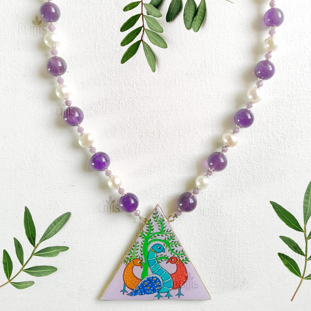 Jade and pearl peacock necklace with intricate Gond art design