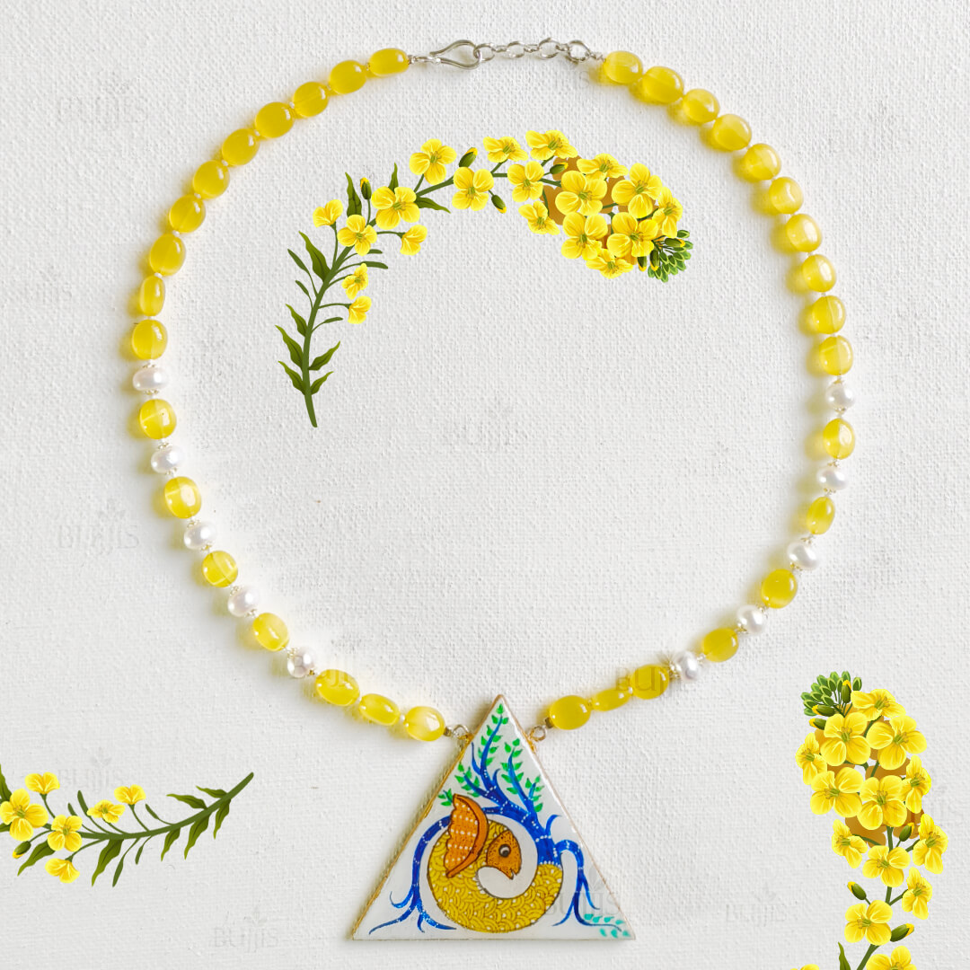 Gond painting fish necklace with intricate tribal design