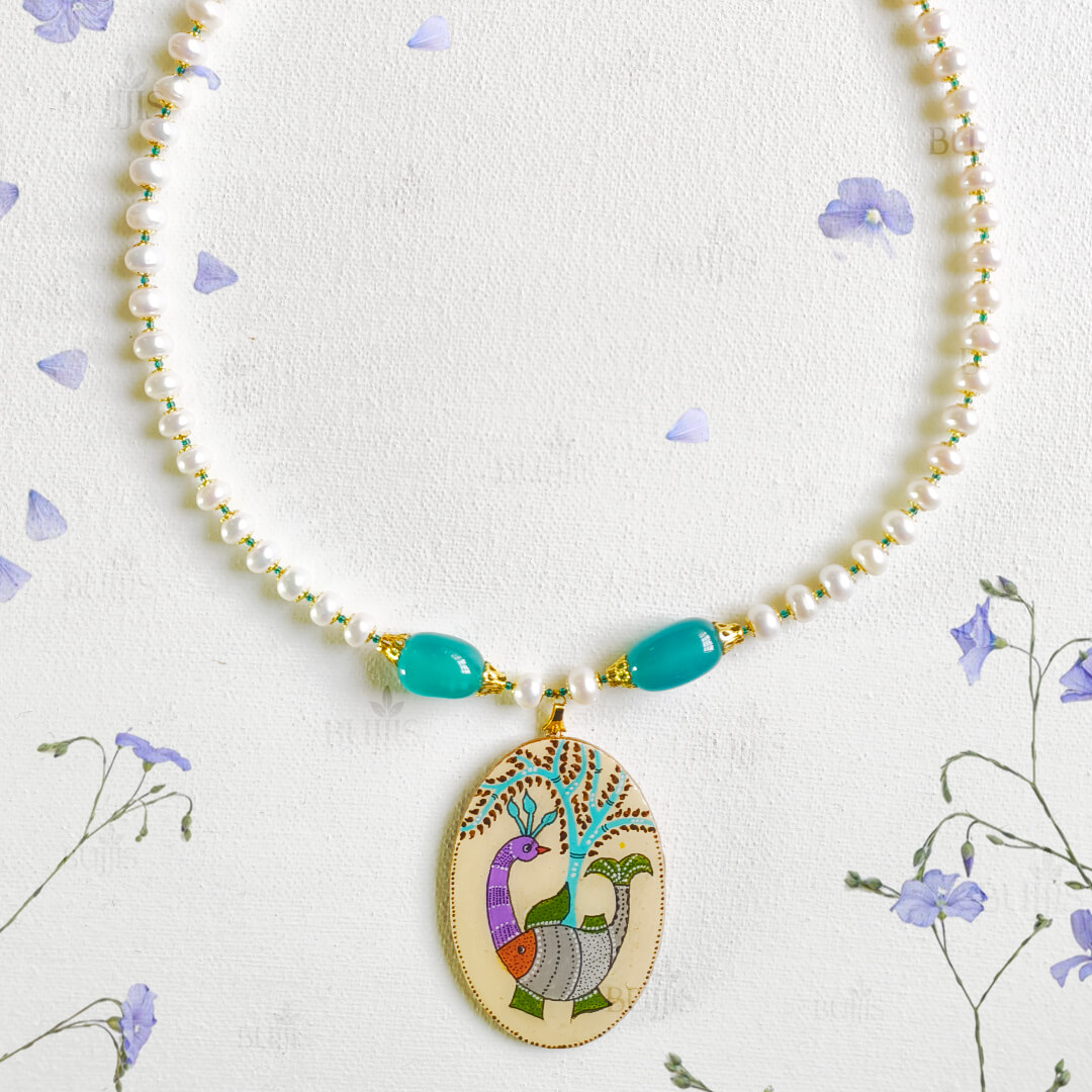 Gond art necklace with peacock pendant and pearl beads