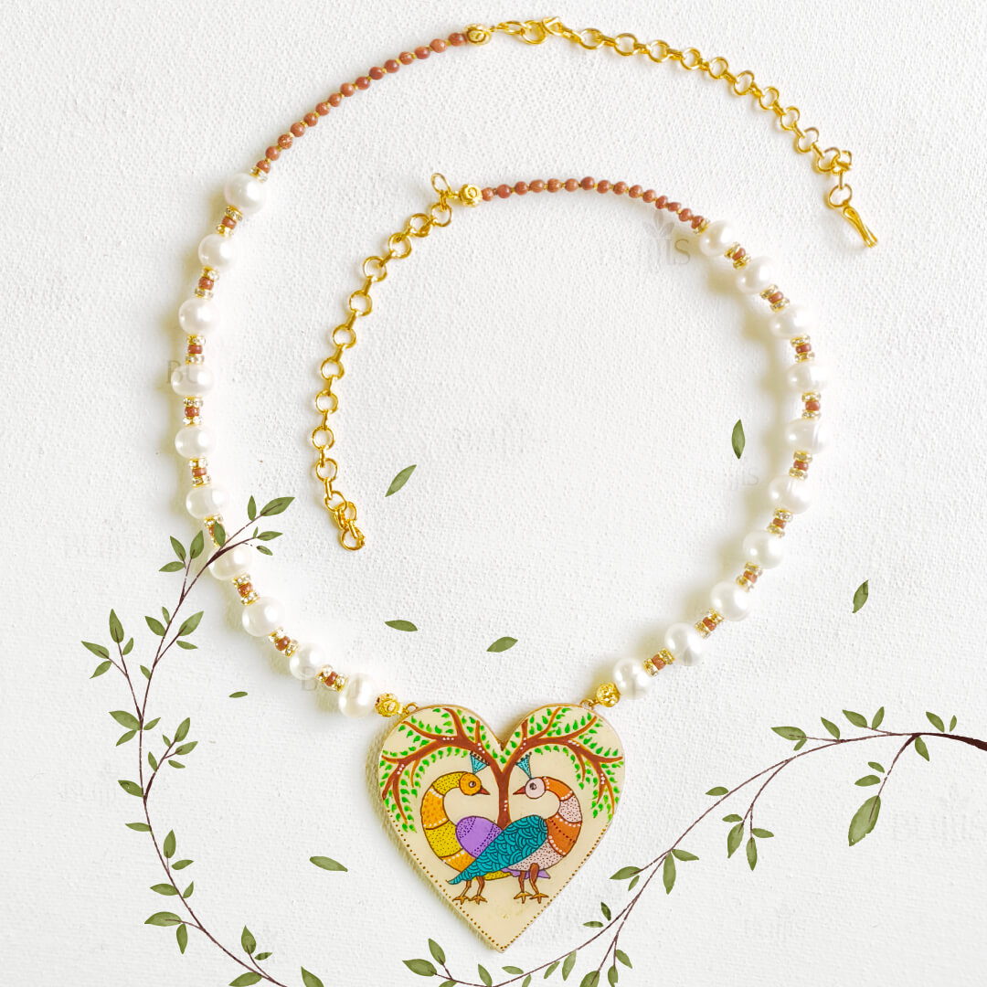 Tribal peacock necklace featuring two majestic peacocks