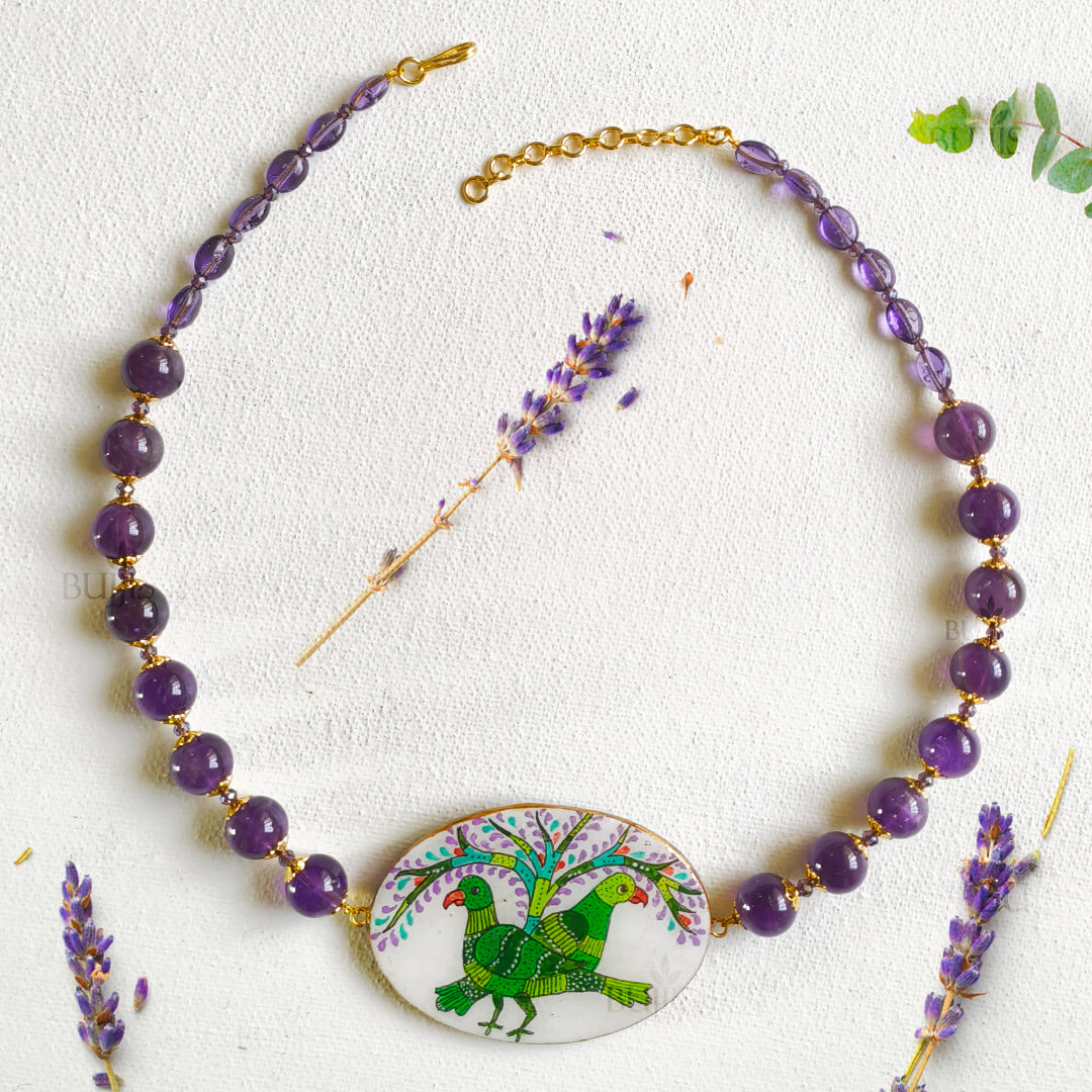 Gond art parrot necklace featuring colorful parrots