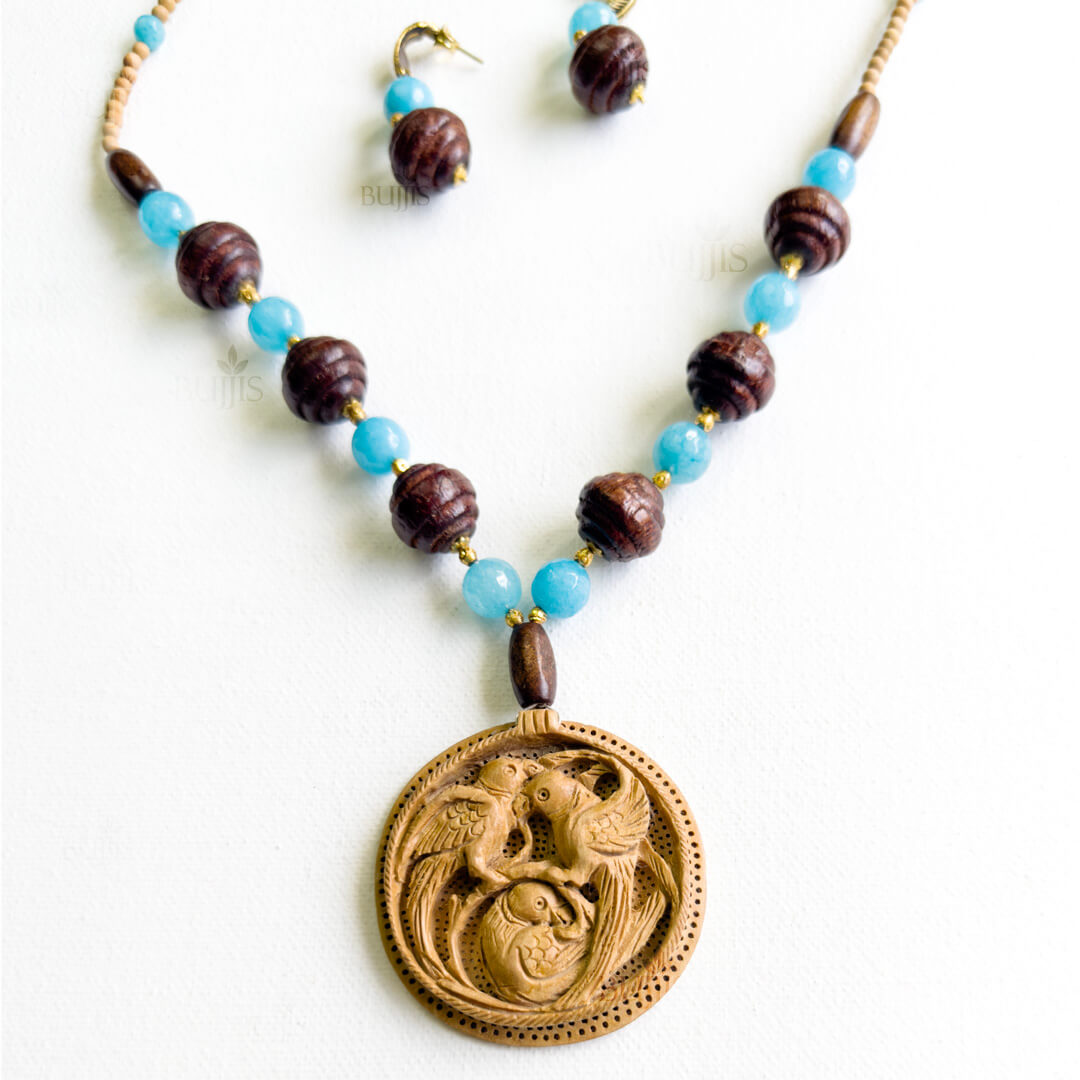 Sky Flight Necklace & Earring Set with wooden bird pendant, blue and brown beads, golden spacers