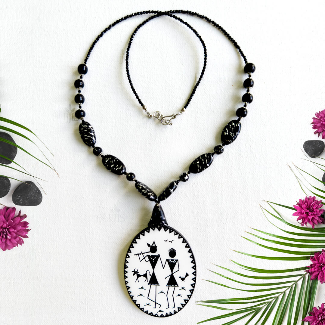 Monochrome Pulse handcrafted necklace with black beads and tribal motif pendant by Bujjis