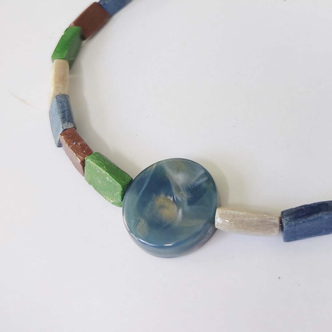 ColorBlock Charm polymer clay bracelet with multicolored block beads and blue marble-effect centerpiece – handmade by Bujjis.in