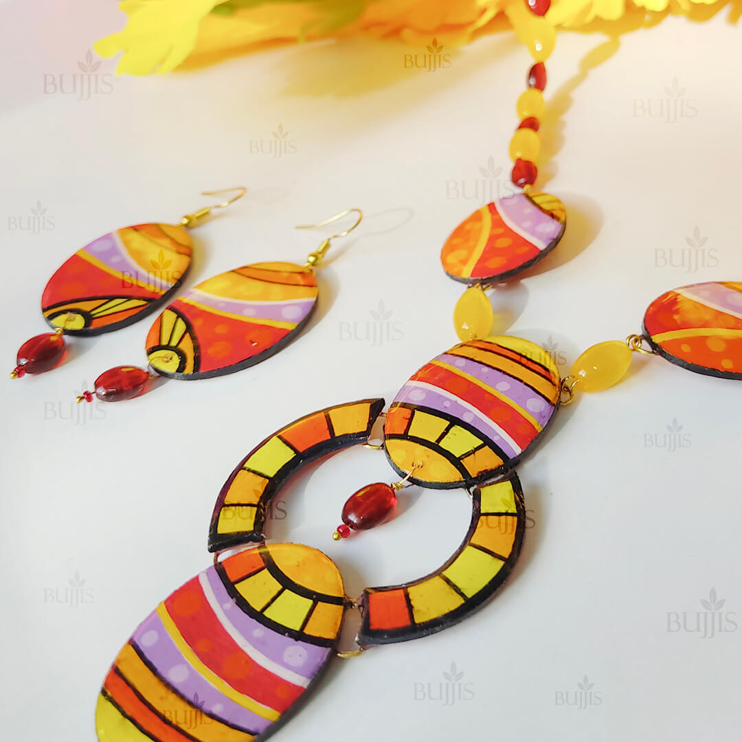 Handcrafted polymer clay necklace with bold geometric patterns