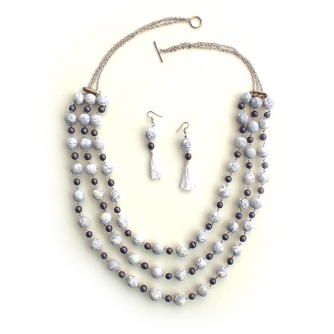 Ivory Echo handmade polymer clay necklace set with matching tassel earrings – Bujjis.in