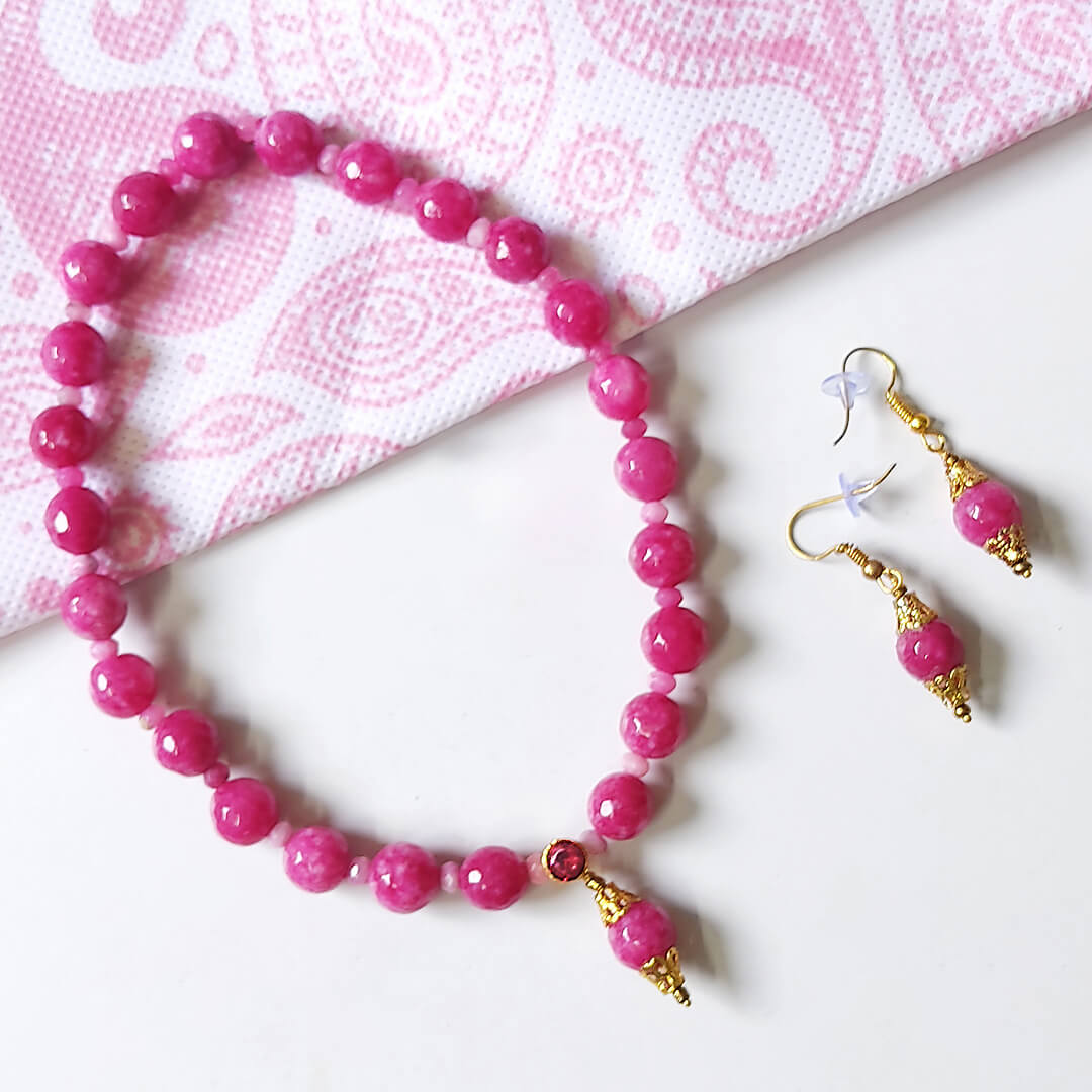 pink kids jewellery set with polymer clay necklace and matching drop earrings