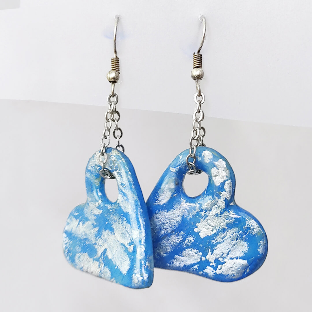 Cloud Hearts blue polymer clay earrings with cloud-silver highlights and dangling chain – handcrafted heart-shaped earrings by Bujjis.in