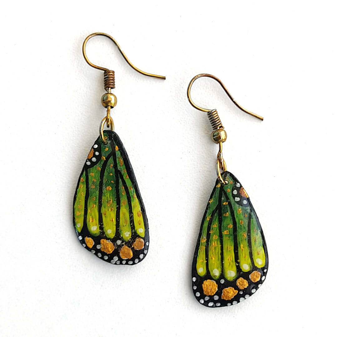 Leaf Wing green polymer clay earrings with butterfly wing design and hand-painted details – handmade by Bujjis.in