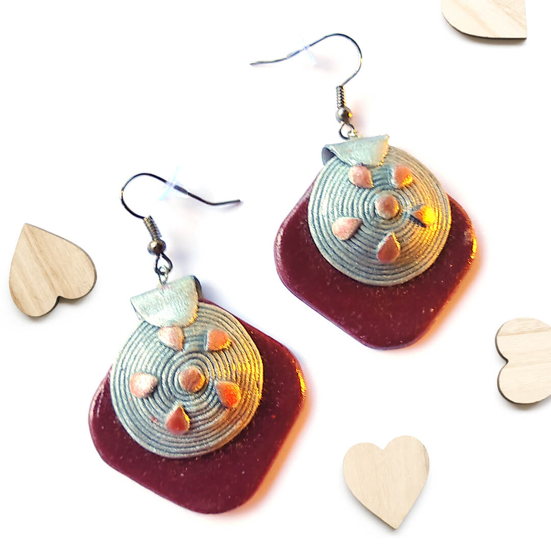 Vintage Bloom maroon polymer clay earrings with floral design, metallic accents, and soft pink details – handmade by Bujjis.in
