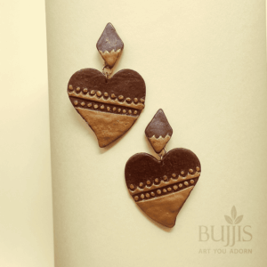 Polymer clay heart earrings in brown and gold with handcrafted design by Bujjis