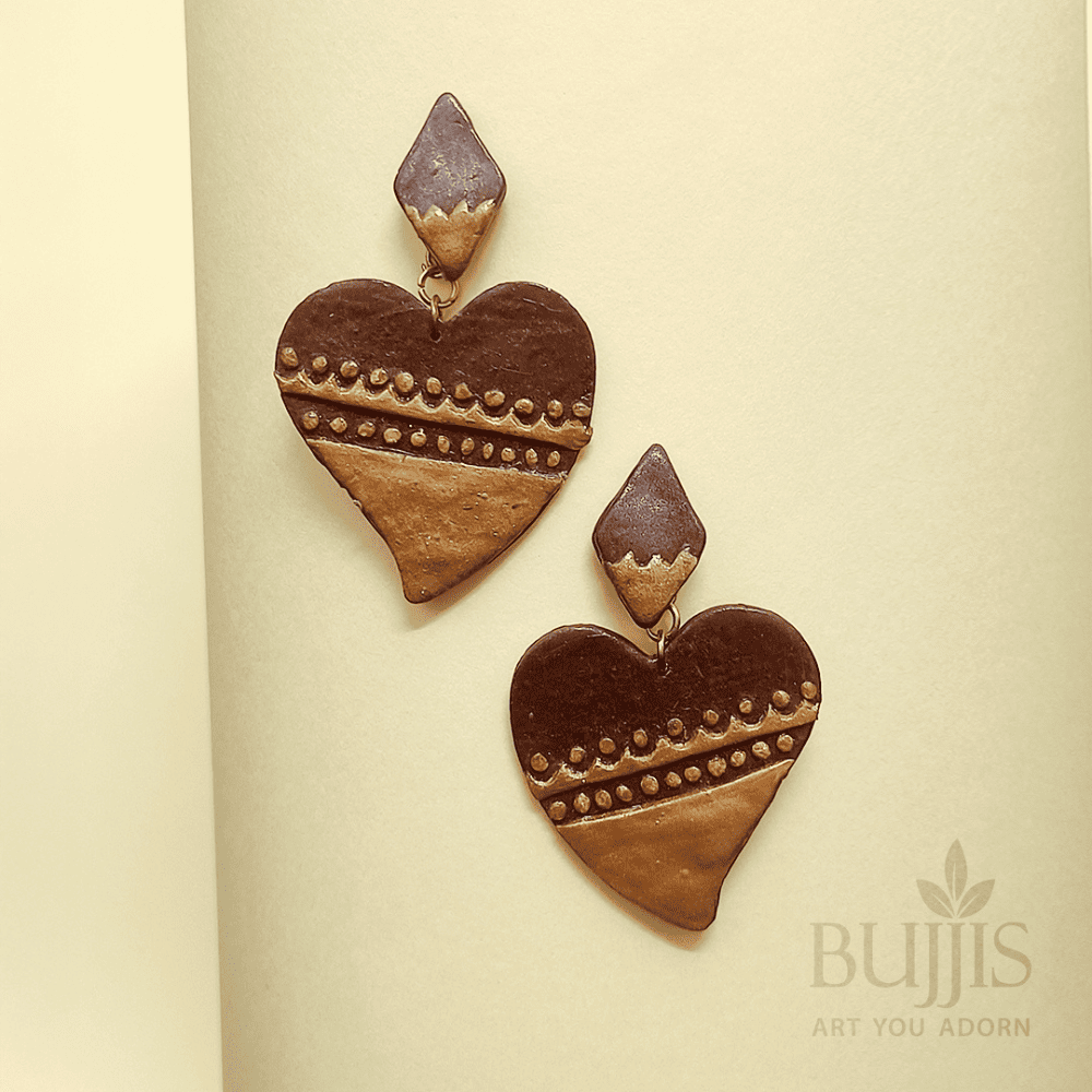 Polymer clay heart earrings in brown and gold with handcrafted design by Bujjis