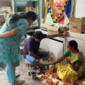 talking with Skilled artisan handcrafting intricate wearable Indian art jewellery at Bujjis.